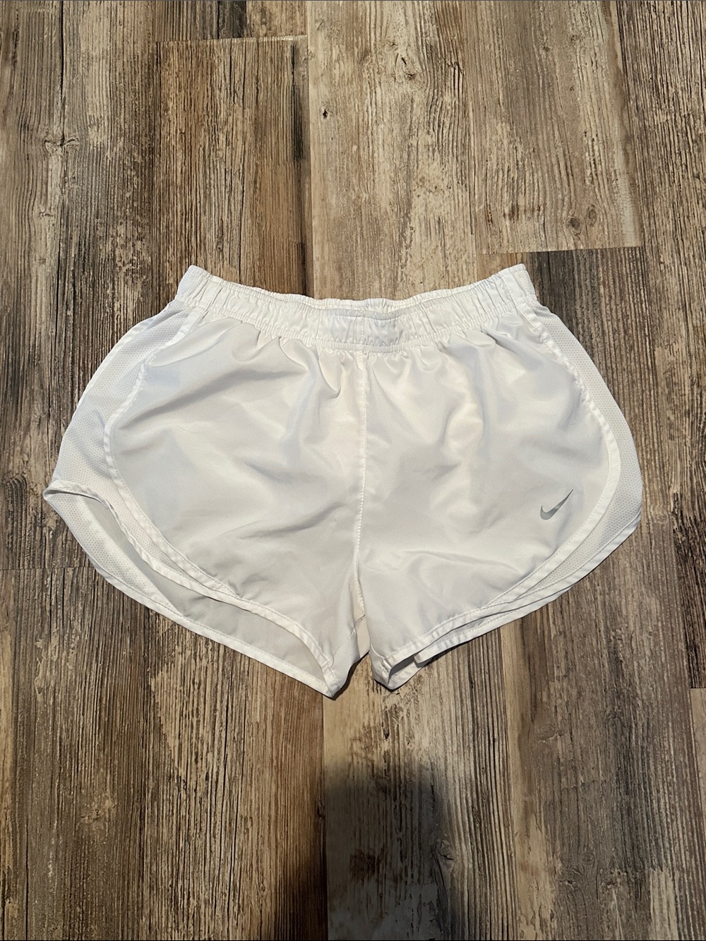 Nike Women's White Athletic Running Shorts with Subtle Swoosh
